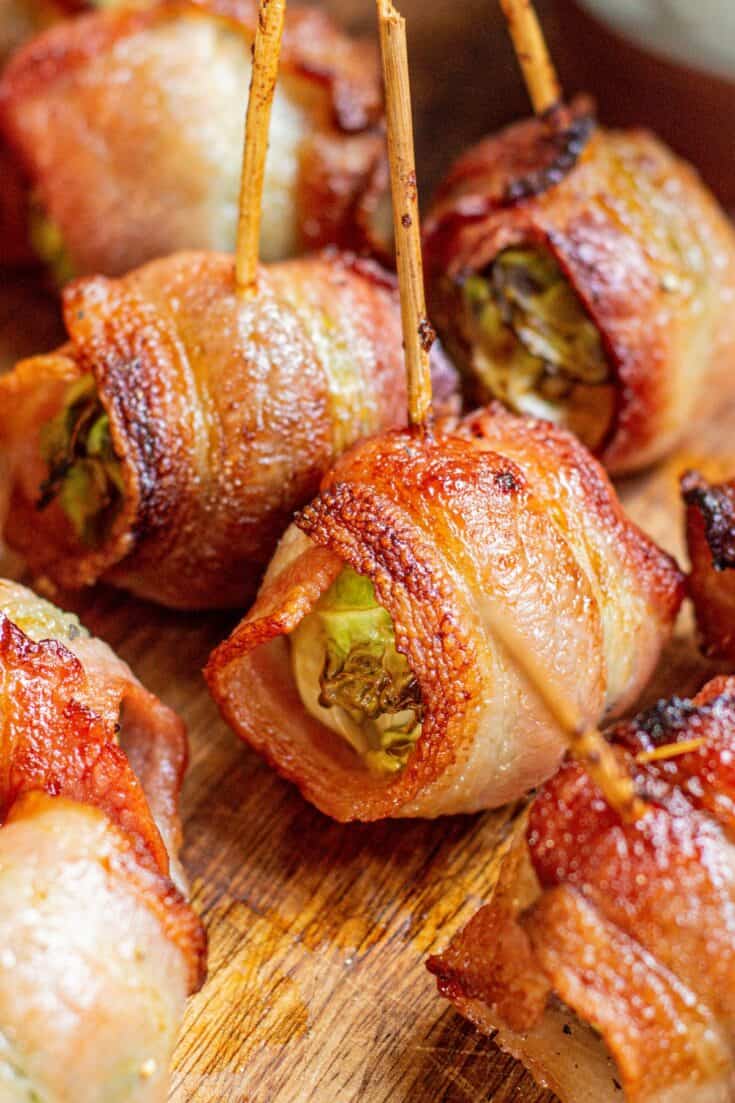 bacon wrapped sprouts with toothpicks.